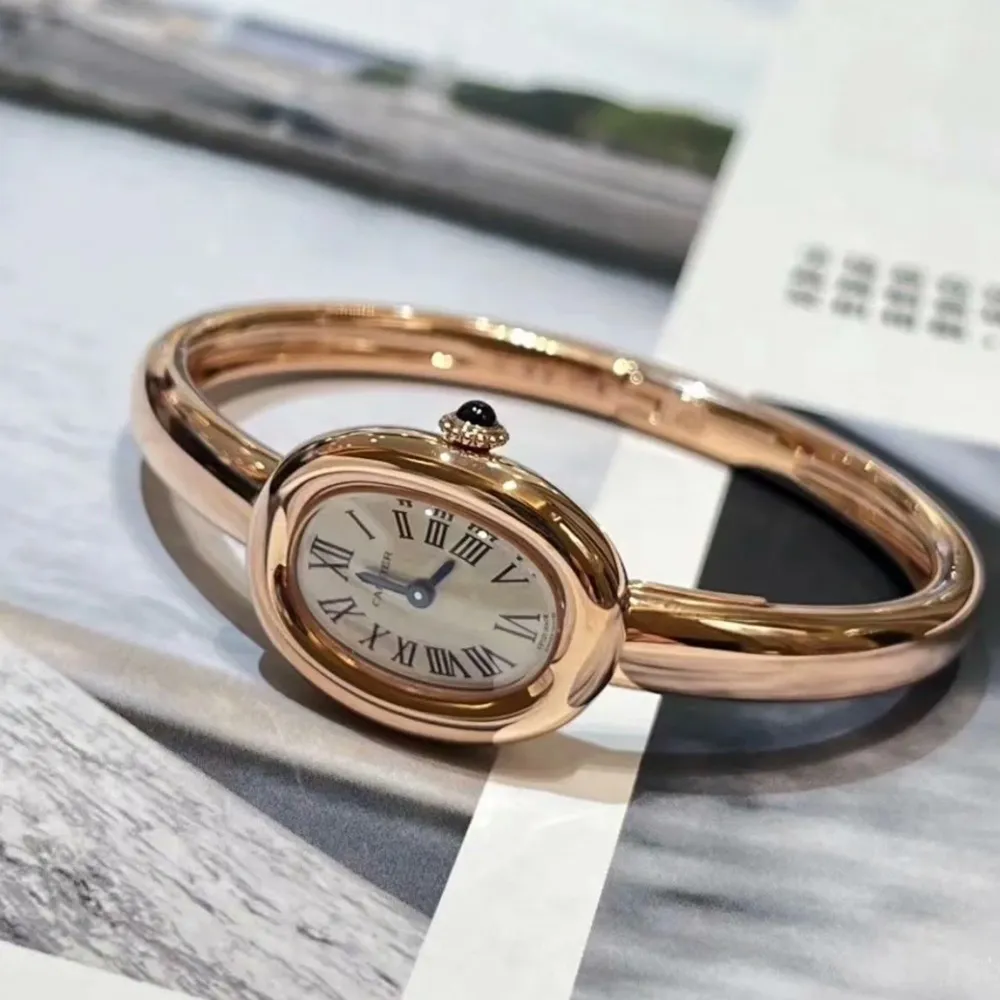 Cartier Baignoire 1920 Rose Gold Dupe Watch on Table Display