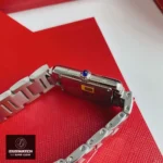 Super Clone Cartier Tank Must WSTA0051 Watch Side View, Stainless Steel and Blue Gemstone Crown Close-up.