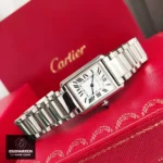 Super Clone Cartier Tank Must WSTA0051 Watch Placed on Top of the Packaging Box.