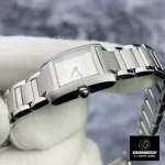 Flat lay display of the Super Clone Cartier Tank Francaise Watch, featuring the stainless steel case and bracelet