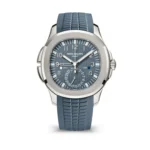The super clone Patek 5164G-001 Aquanaut Travel Time watch is showcased with its stainless steel case, blue dial, and rubber strap