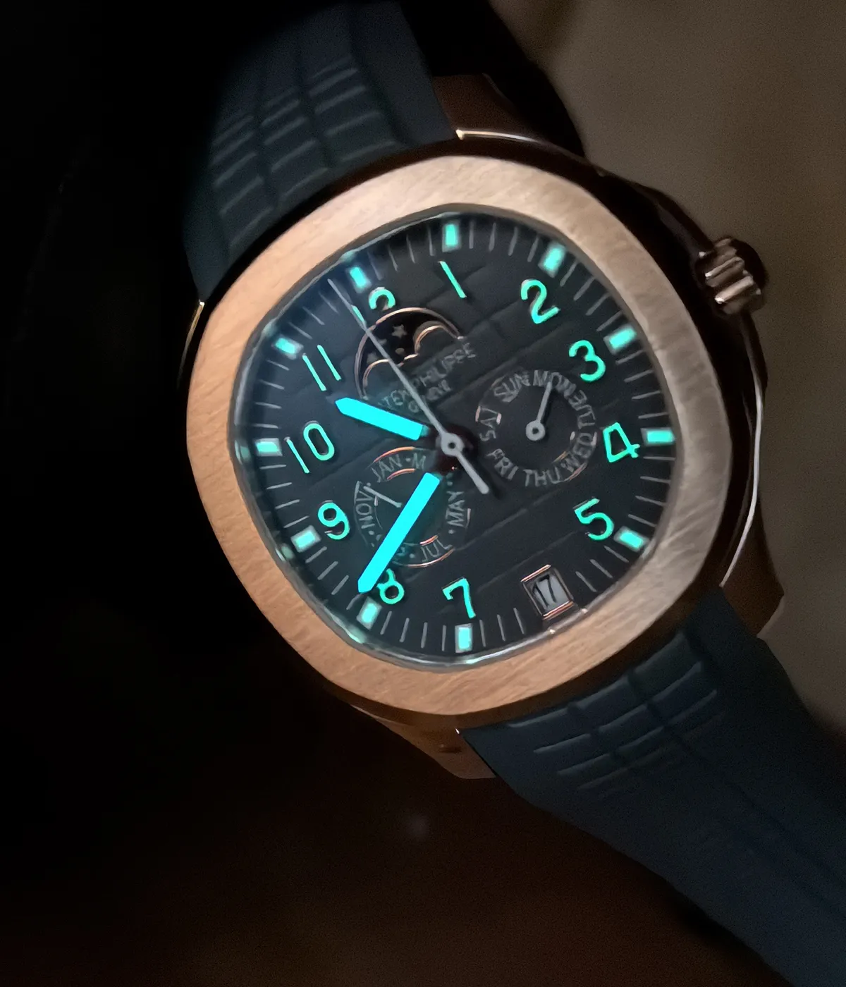 Patek Philippe Aquanaut Luce 5261R showing low-light appearance — dial and marker visibility under dim lighting conditions.