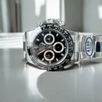 Rolex Daytona Black 116500LN Super Clone Watch Placed Sideways on a Table