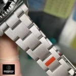 Detailed view of the 904L stainless steel bracelet on the Super Clone Rolex Submariner No Date 114060 watch.