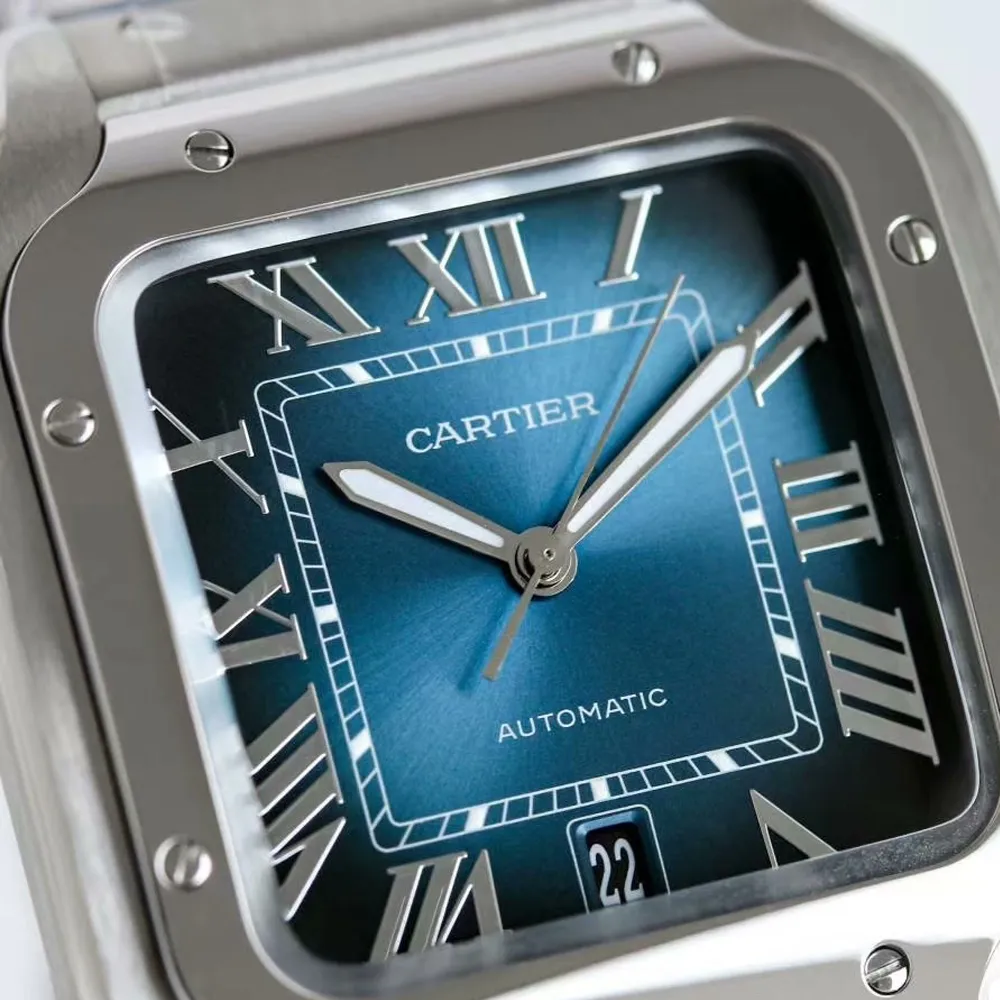 Close-up of Super Clone Cartier Santos WSSA0071 Watch Blue Dial, Featuring Metal Hour Markers, Sword-Shaped Hands, and Date Window