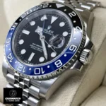 Super Clone Rolex Batgirl GMT Master II Watch Close-up of Stainless Steel Case with Crown