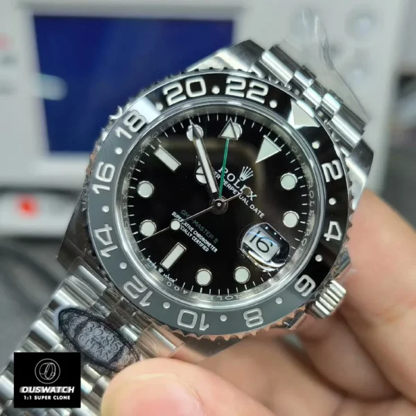 45-degree angle display of Super Clone Rolex Bruce Wayne GMT 126710GRNR watch dial and appearance