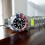 Super Clone Rolex Pepsi Top Replica Watch on Desk