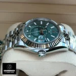 Replica Rolex Sky-Dweller Green Dial 180° Close-Up - Iconic Fluted Bezel & Twinlock Crown