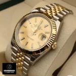 Replica Rolex Datejust Two Tone Watch at a 45-degree angle, showing off the two-tone stainless steel and yellow gold design.