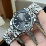Replica Rolex Datejust Grey Dial 126334 Watch 75-degree angle displaying the subtle elegance and attention to detail of the grey dial and steel case.