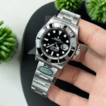 75-degree angle view of Rolex 126610LN-0001 showcasing the stainless steel case and black dial.