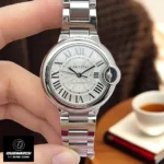 Cartier Ballon Bleu 33mm Watch front view held in hand.