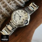 Cartier Ballon Bleu 33mm Watch elegantly placed on the table.