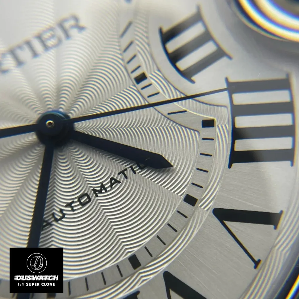 Close-up of the Cartier Ballon Bleu 33mm Watch dial, showcasing detailed textures, Roman numerals, and precise hands.