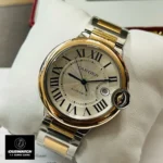 45-Degree View of Cartier Ballon Bleu Two-Tone Super Clone Watch, featuring a stainless steel and gold two-tone case with a silver dial.