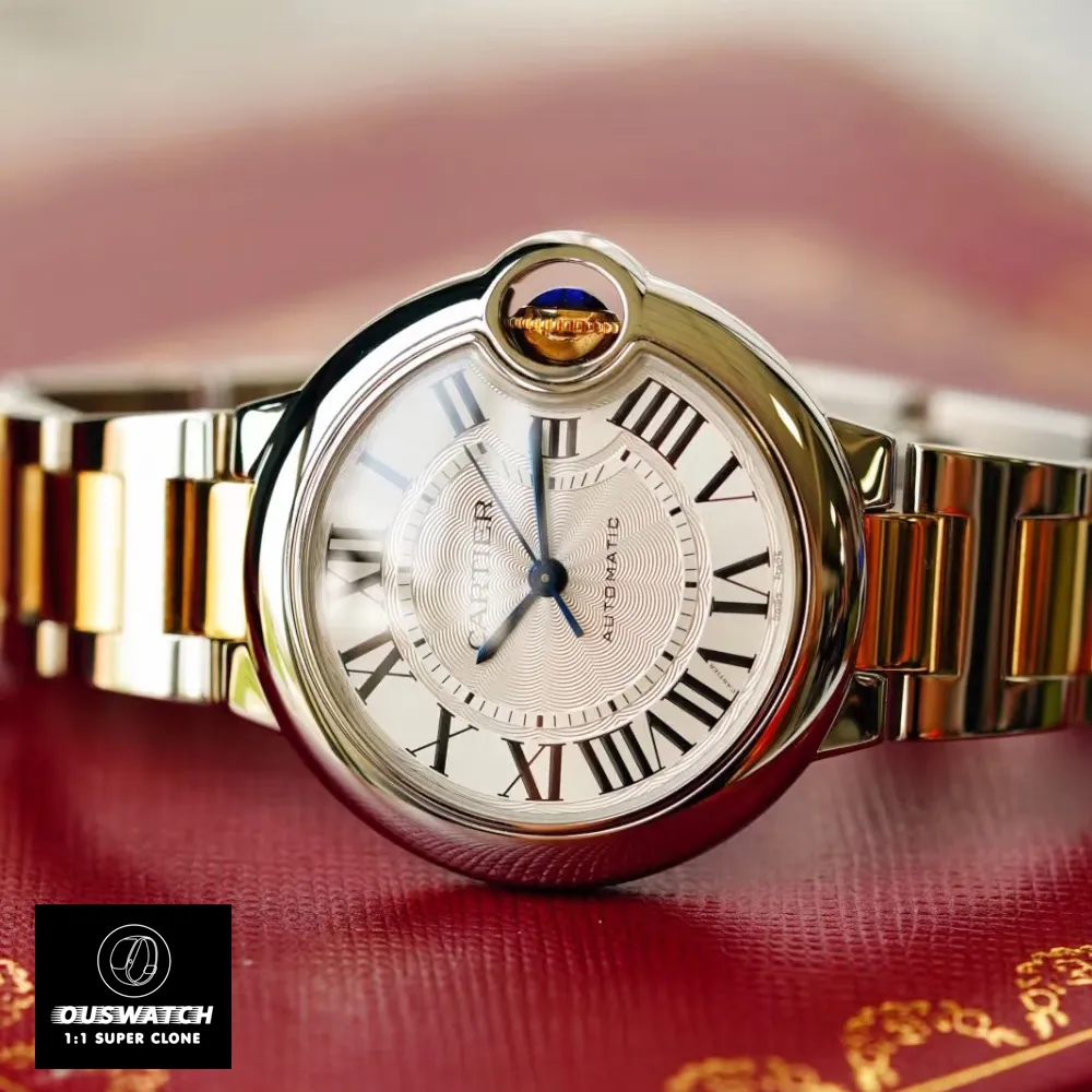 Cartier Ballon Bleu Two-Tone Watch Standing Sideways on a Red Packaging Box