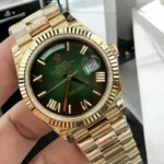 Top Replica Rolex 228238-0069 Watch, displayed at a 120-degree angle, close-up of the green dial, emphasizing its rich color and sophisticated design.
