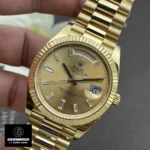 Replica Rolex 228238 Day Date 40 Presidential Watch with a champagne diamond dial close-up, highlighting the luxurious diamond markers and refined craftsmanship.