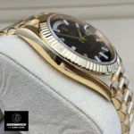 Replica Rolex 228238 Day Date 40 Watch side view, emphasizing the luxurious yellow gold case and refined design.
