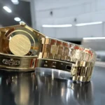 Top Replica Rolex 228238 Watch with concealed folding crownclasp, emphasizing the secure and elegant clasp design.