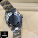 Replica Rolex m124300 Oyster Perpetual with Celebration Dial, showing the detailed back view and Oystersteel case construction.