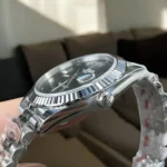 Rolex Datejust Oyster Perpetual Wimbledon 126334 Replica Watch - Side View of Stainless Steel Case and Crown