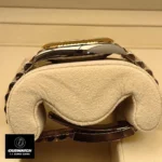 Replica Rolex Datejust Two Tone Watch side view displaying the flawless finish of the Oystersteel case and yellow gold bezel.