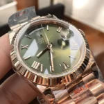 Replica Rolex Day Date 40 Blue Dial Watch with a close-up view of the rose gold case