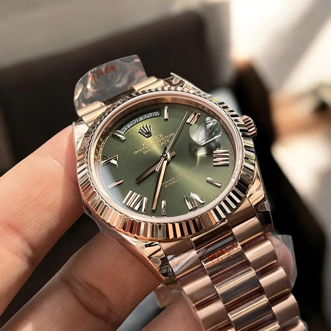 Replica Rolex Day-Date 40mm Rose Gold Watch showcasing the fine details of the case and bezel, crafted from luxurious rose gold.