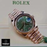 Replica Rolex Day Date Rose Gold m228235 Watch displayed in a watch box