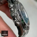 Rolex Daytona 126500LN Stainless Steel Watch Button Detail: Circular button design with a polished surface for a refined appearance.