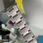 Rolex Daytona Black Dial Watch with Oyster Bracelet: Made from 904L stainless steel, featuring a classic three-link design.