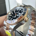 Super Clone Rolex 126711CHNR side view close-up of the rose gold crown.