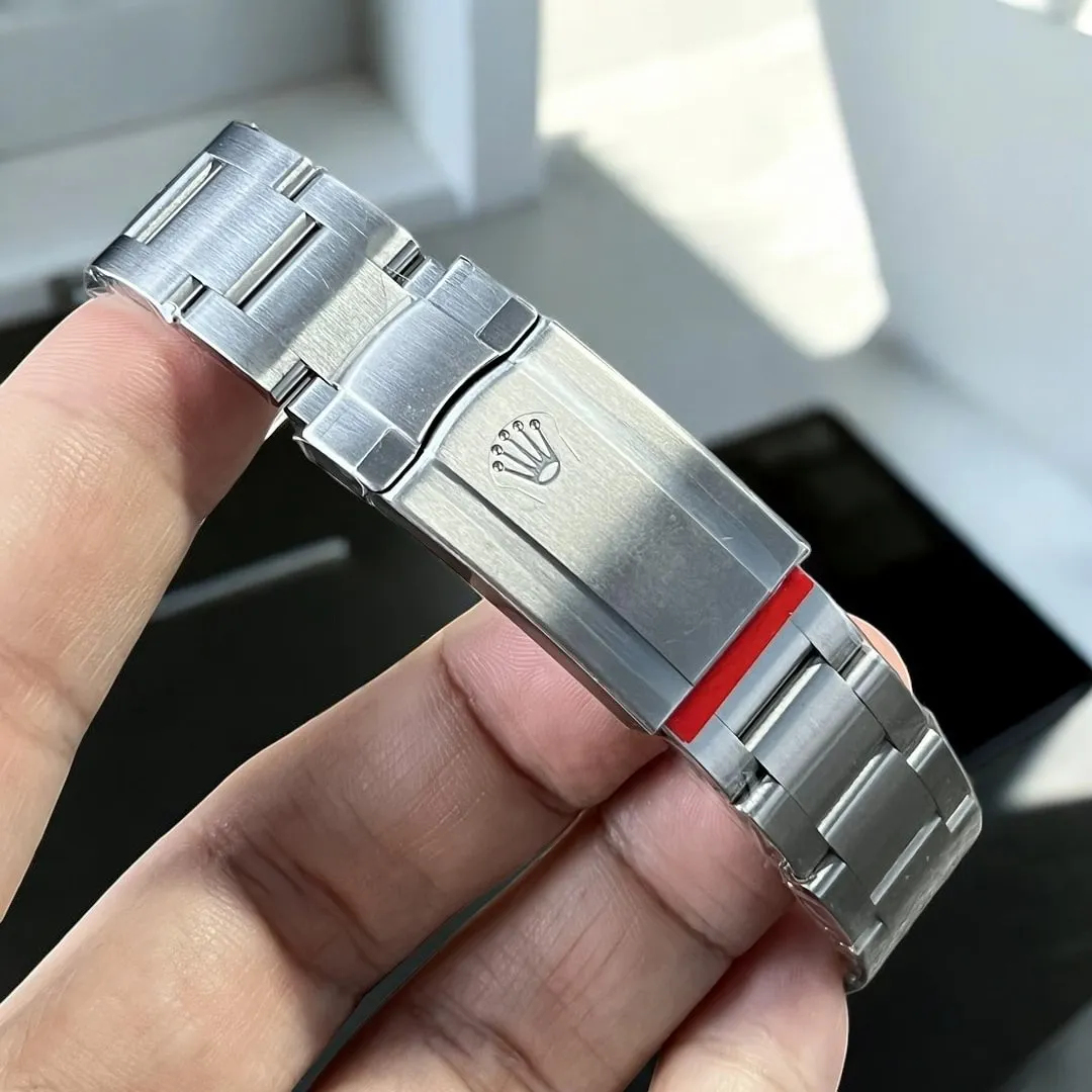 Replica Rolex with light blue face watch, featuring a durable Oyster bracelet made from high-quality Stainless Steel, combining style and comfort.