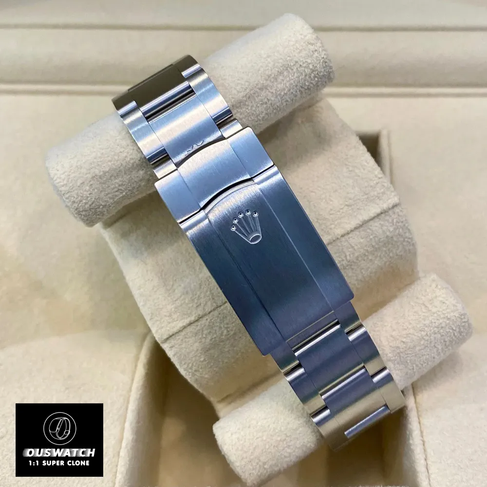 Replica Rolex Oyster Perpetual 124300 with Oyster bracelet, offering a closer look at the refined bracelet links.