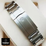 Replica Rolex Oyster Perpetual 124300 watch clasp, showcasing the secure and reliable Oysterclasp for comfort and durability.