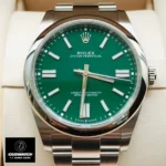 Replica Rolex Oyster Perpetual Green Dial Stainless Steel watch front view, displaying the exquisite green dial and robust Oystersteel case design.