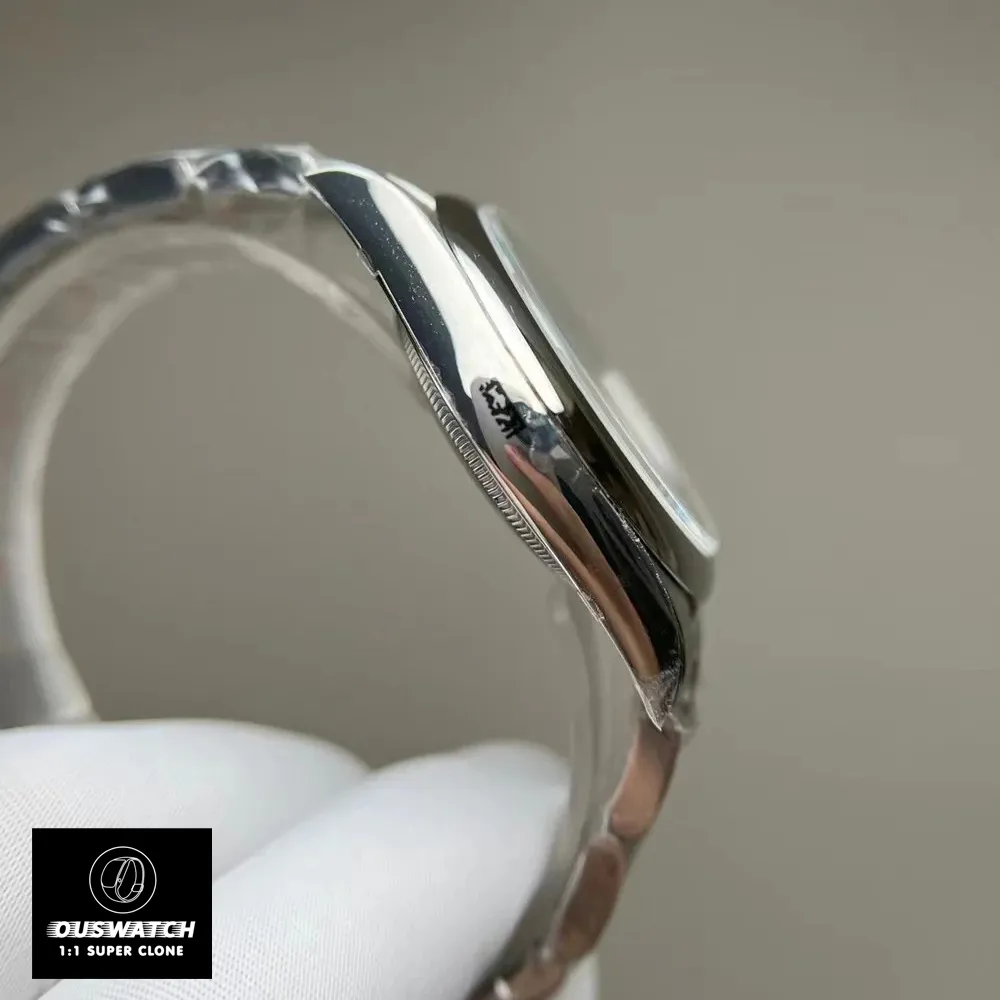 Replica Rolex Tiffany Blue Dial 124300 watch side view, highlighting the sleek profile and elegant Oystersteel case.