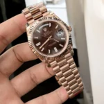 Super Clone Rolex m228235-0003 Watch featuring a rose gold case and President bracelet