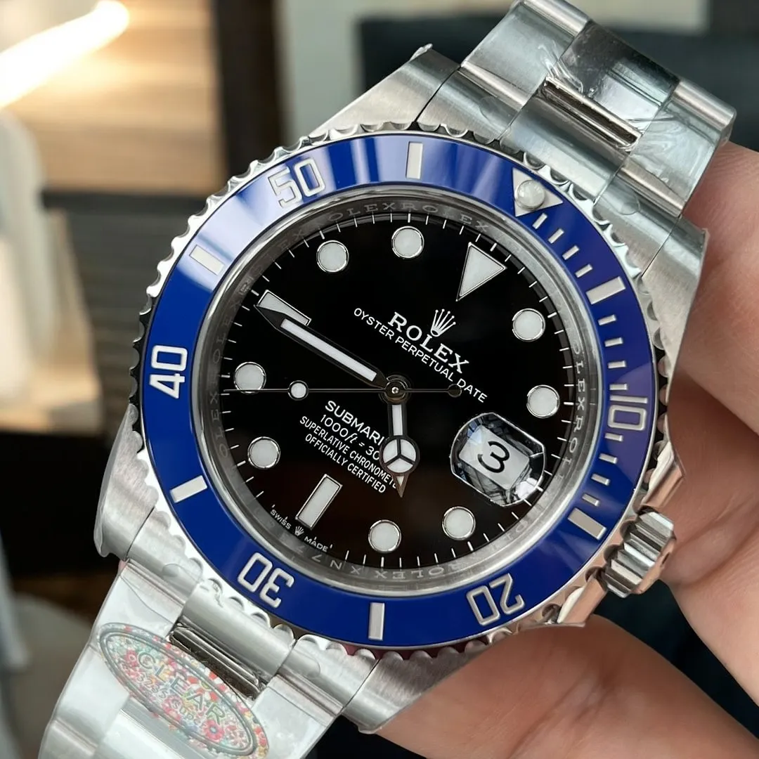 Super Clone Rolex 126619LB Watch with blue bezel, black dial, and 18kt case display