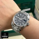 Replica Rolex Sky-Dweller Black Dial on Wrist - Luxury Style