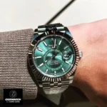 Wearing Rolex Sky Dweller Green Dial Stainless Steel Replica Watch