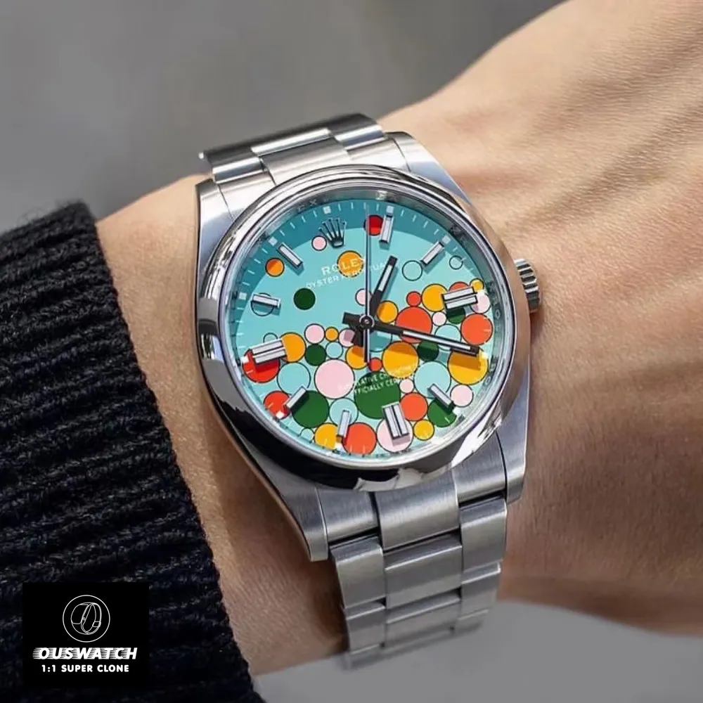 Replica Rolex 124300 Oyster Perpetual 41, worn on the wrist, highlighting its elegance and the iconic Celebration Dial.