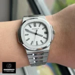 Super Clone Patek Philippe Nautilus 5711 white dial watch worn on the wrist, demonstrating its elegant presence.