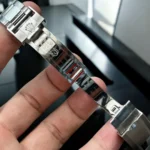 Close-up of the unfolded clasp of the Rolex Daytona Platinum Ice Blue watch.