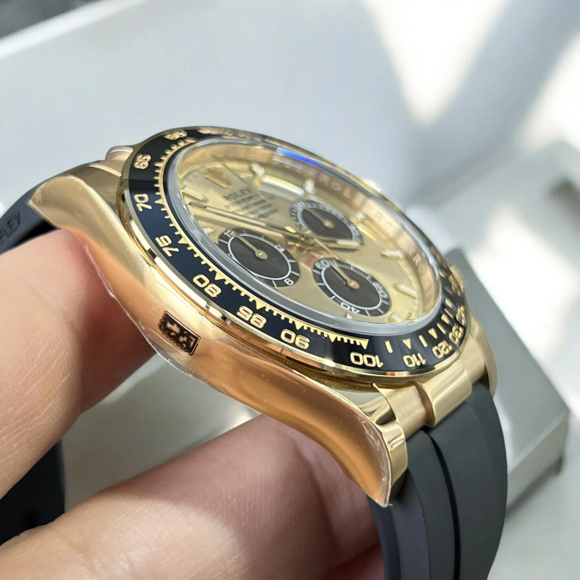 Super Clone Rolex Daytona Gold and Black Watch Side View