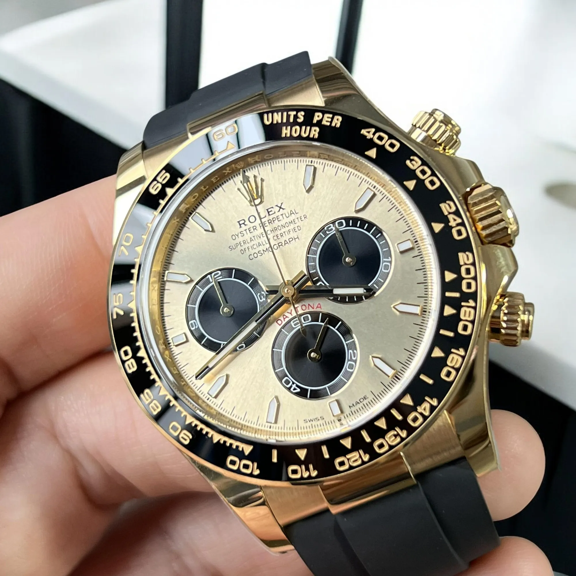 Rolex Daytona Yellow Gold Black and Gold Dial Close-up