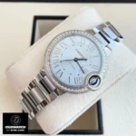 45-degree angle showcasing the Cartier Ballon Bleu blue dial watch dupe, model W4BB0028.