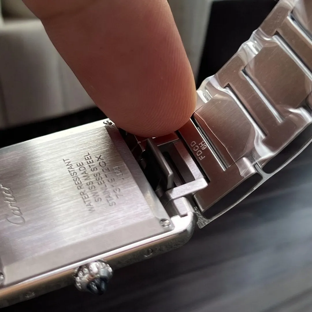 Alternative rear angle of the Cartier Tank WSTA0052 watch dupe, highlighting the case back and integrated lugs.